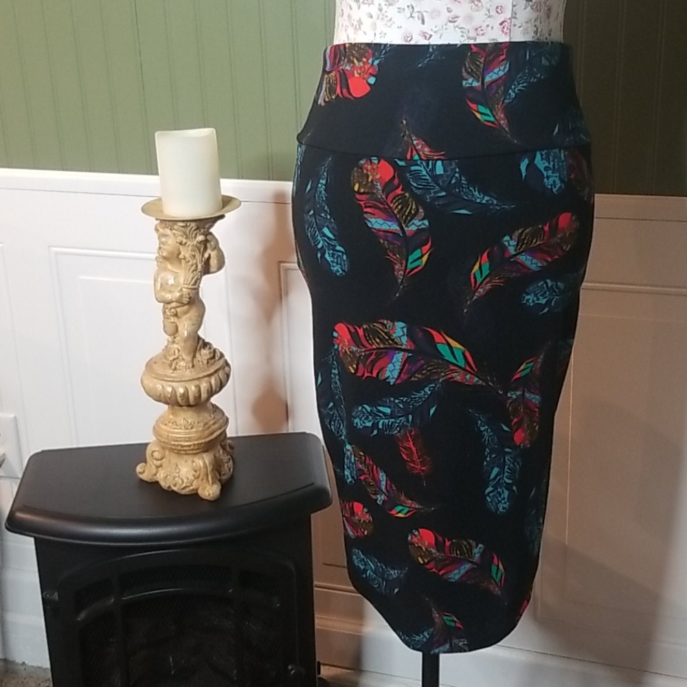 LulaRoe Skirt size small black w/colorful leaf's